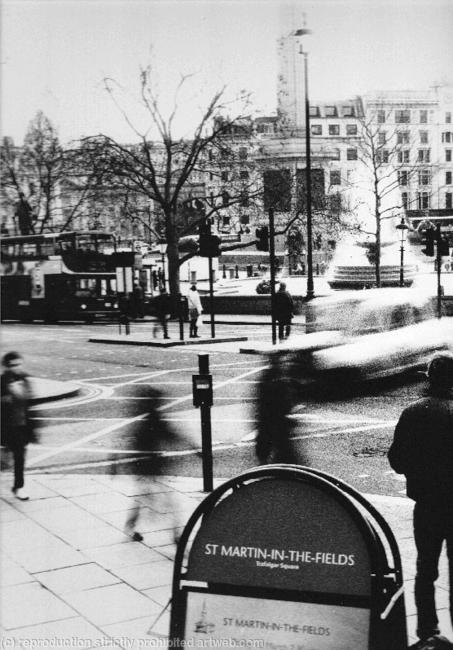 London scene (Taxi with people)
