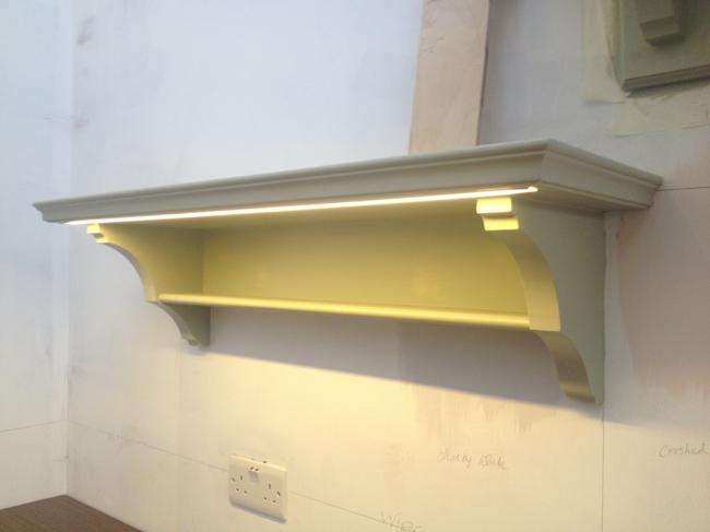 arts and crafts shelves with lighting