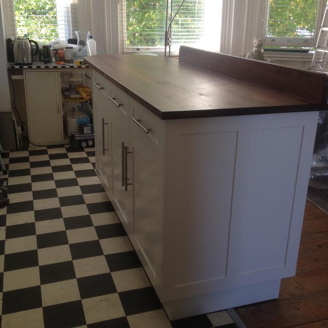 bespoke kitchen unit with walnut top