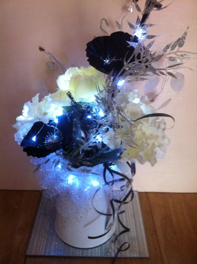 Black, cream and silver jug (white lights)