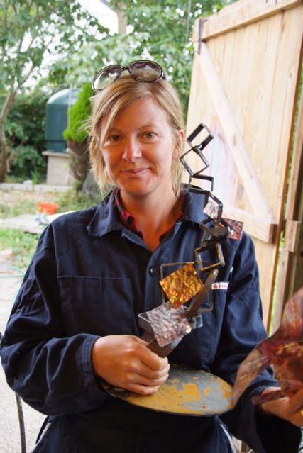 Kate, a student, with her sculpture