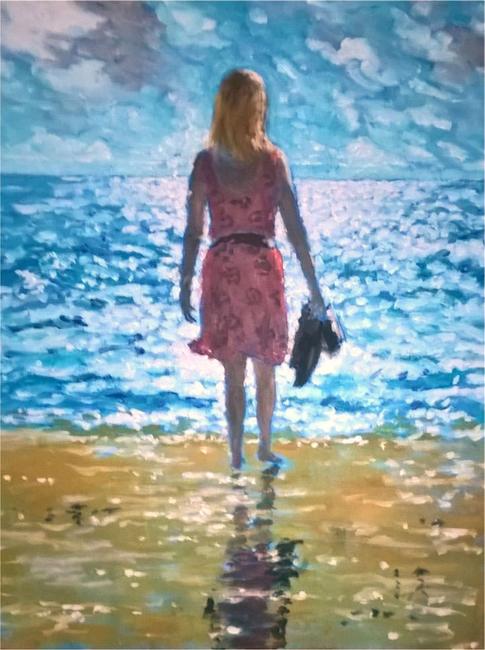 girl backlit by sea
