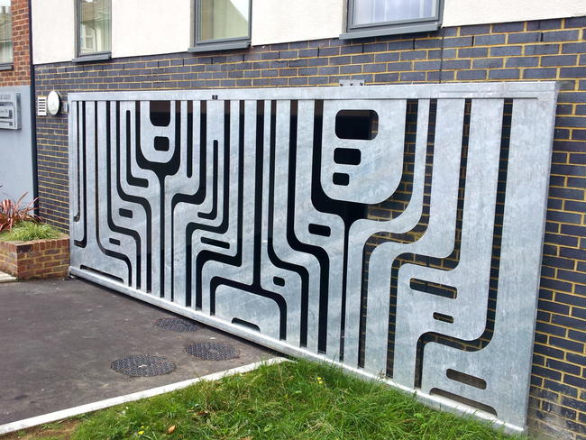 Diamond Court gate, grills, and signage