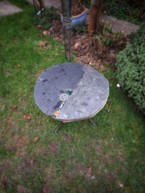 Top view of slate and glass table ref 1