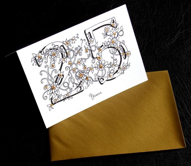 25 years black and gold with gold envelope