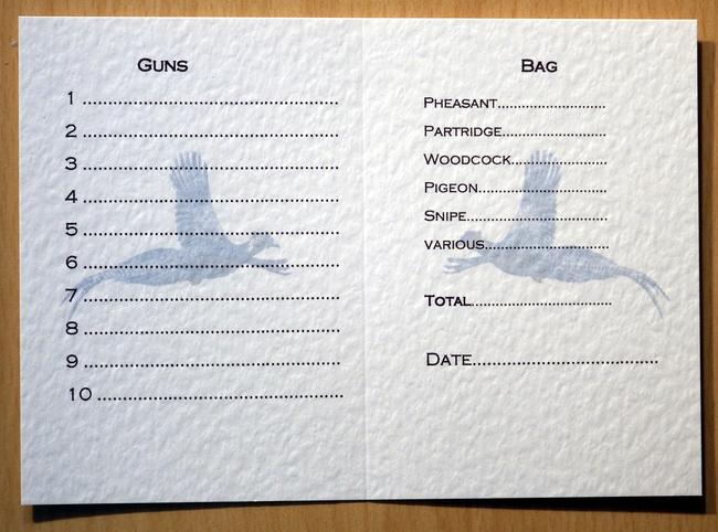 inside shoot card with pheasant watermark wings outstretched
