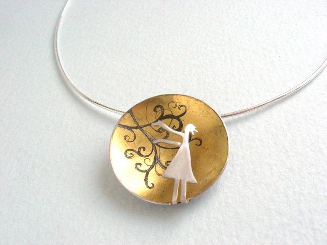 Reaching for the rushing wind pendant