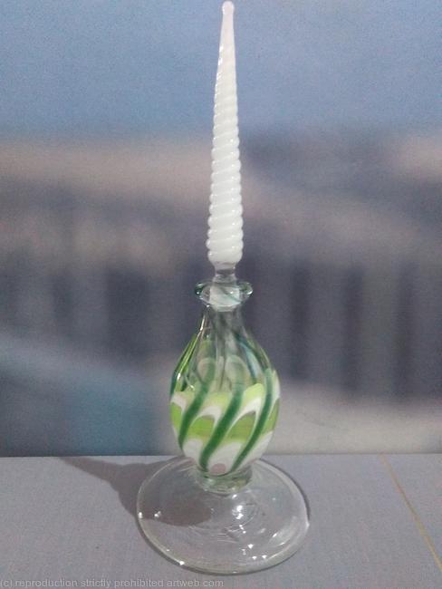 perfume bottle tall white swirl stem with clear green and white floral base