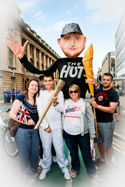 Giant Alan Olympic Torch bearer