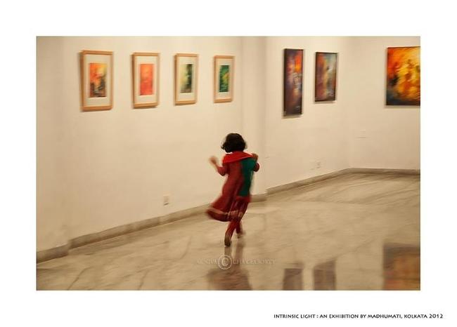 My daughter running across the gallery in glee!