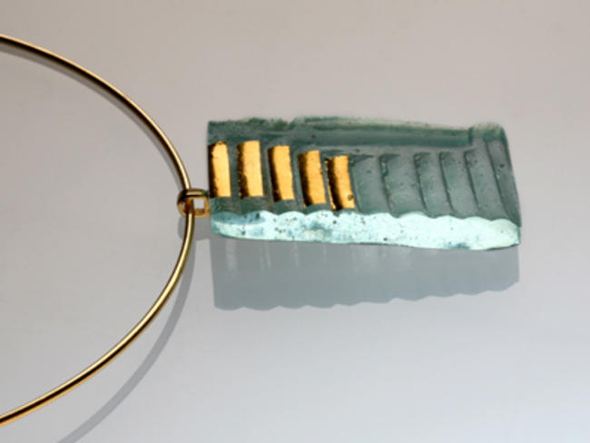 Pale copper blue glass with 23.5ct gold necklace
