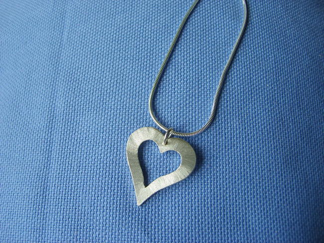 Shimmering heart frame