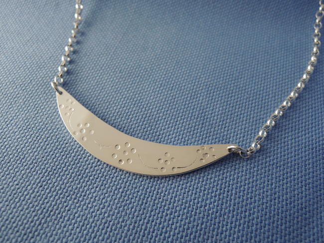 Crescent blossom necklace