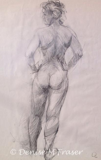 Back view of woman standing, nude.