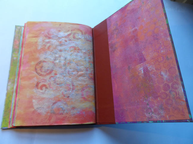 Hard back book of gelli print samples