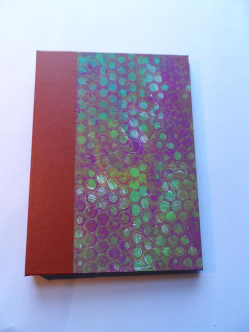 Hard back book with gelli print covers
