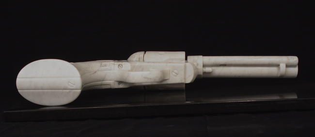 'Peacemaker - the gun', Colt 45 Peacemaker, carved Carrara marble, 3 x life size 776 x 401 x 125mm. Sold to private collection.