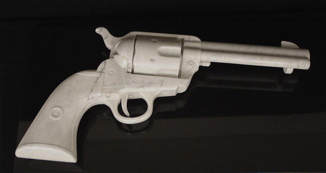 'Peacemaker', Colt 45 Peacemaker, carved Carrara marble, 3 times life size 776 x 401 x 125mm £20,000