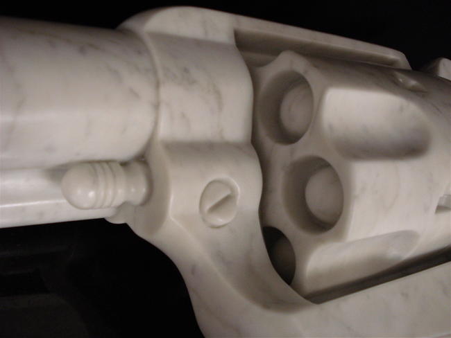 'Peacemaker - the gun', Colt 45 Peacemaker, carved Carrara marble, 3 x life size 776 x 401 x 125mm. Sold to private collection.