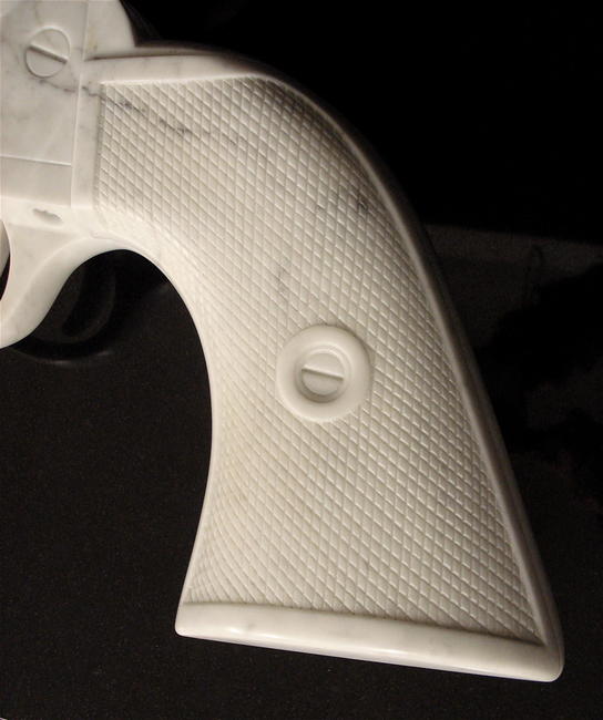 'Peacemaker - the gun', Colt 45 Peacemaker, carved Carrara marble, 3 x life size 776 x 401 x 125mm. Sold to private collection.