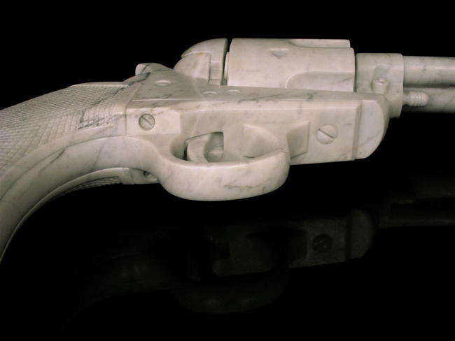 'Peacemaker - the gun', Colt 45 Peacemaker, carved Carrara marble, 3 x life size 776 x 401 x 125mm. Sold to private collection.