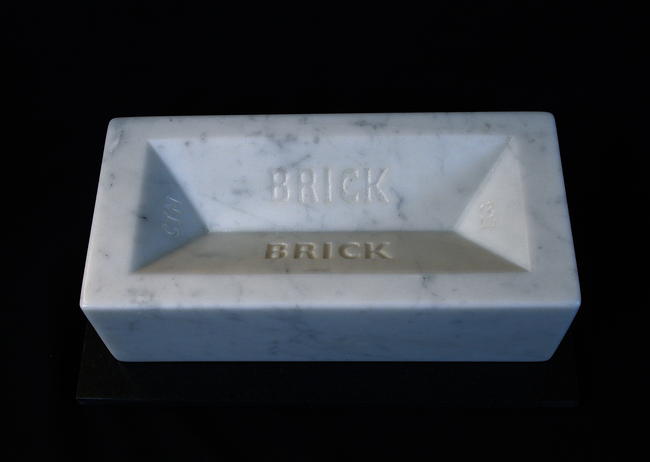The obscene cost of shelter, 'It's not a property ladder anymore, it's a property wall', hand carved Carrara marble, life-size, individually numbered edition of 999