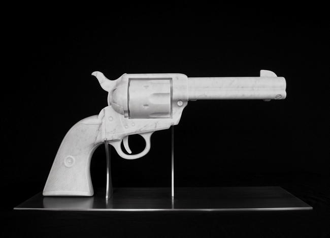 'Peacemaker - the gun', Colt 45 Peacemaker, hand carved Carrara marble on stainless steel stand, 3 x life-size, 850 x 403 x 265mm. Sold to private collection.