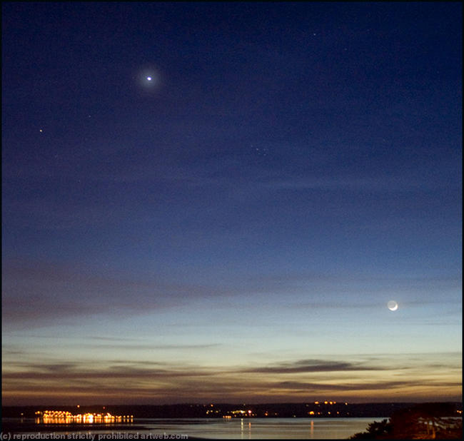 Moonlit view of Beaumaris from Llanfairfechan