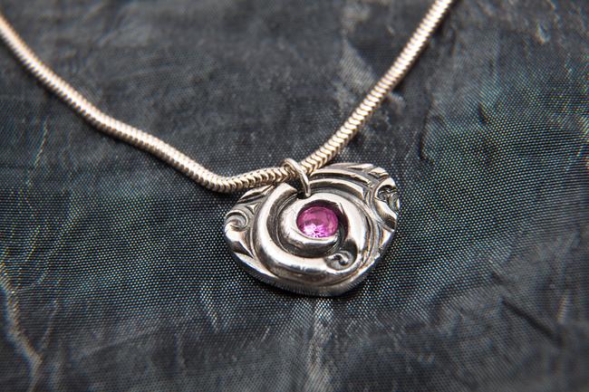 Patterned Heart with Red Stone