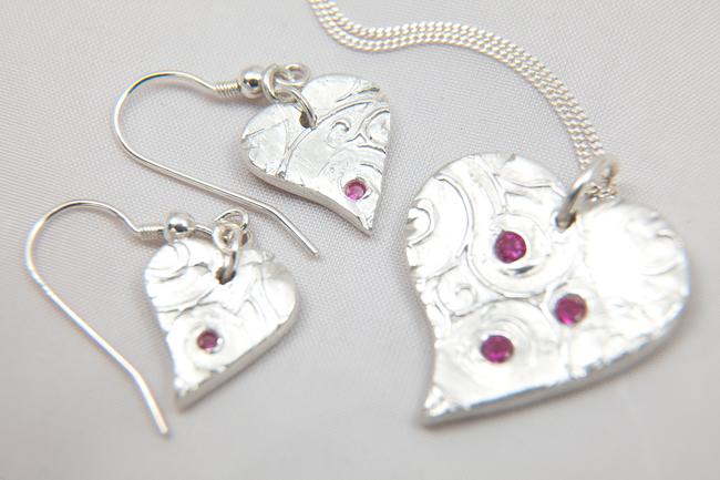 Hearts Set with Red Stones