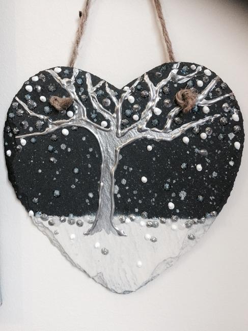 Silver tree on black slate