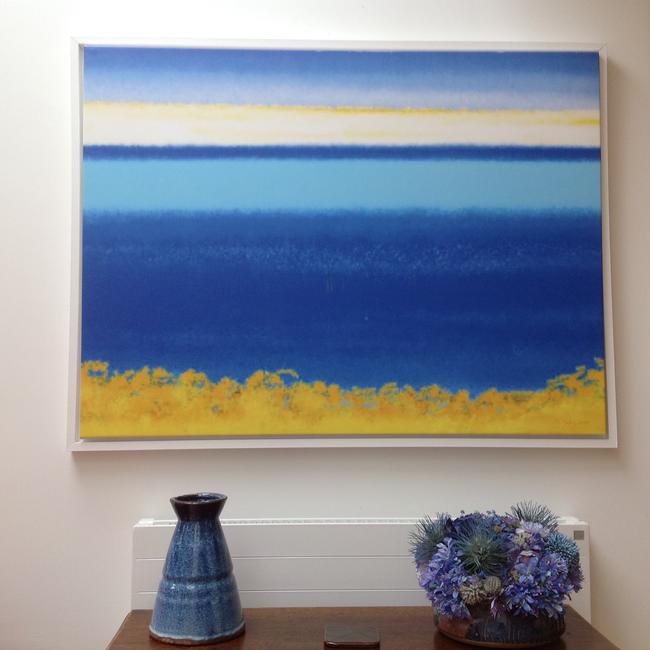'Blue Sea & Gorse' in white floating frame