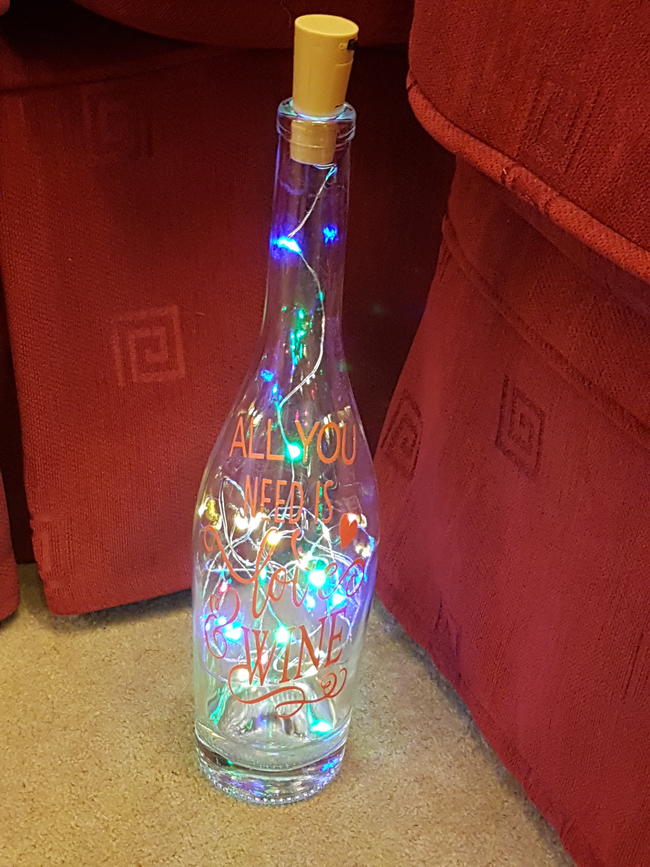 Multi Coloured LED Lights in Clear Glass Bottle With Orange All You Need Is Love
