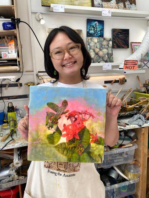 Ria with her photoencaustic piece