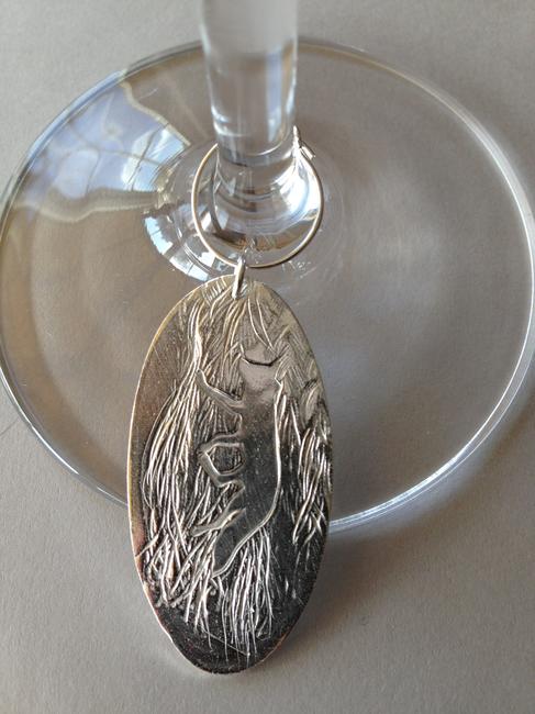 set of four wine glass charms