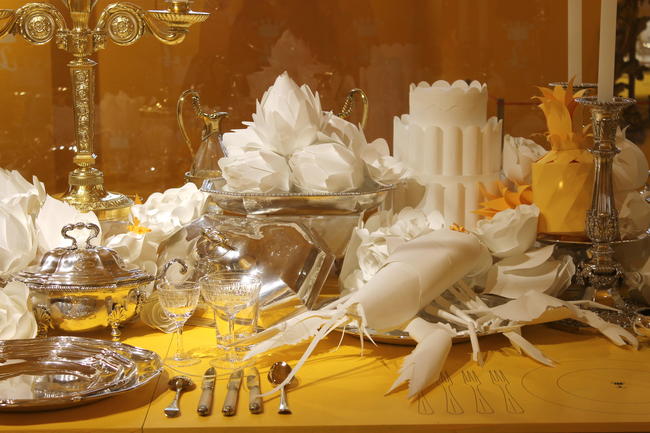 Paper sculptures on banquet table