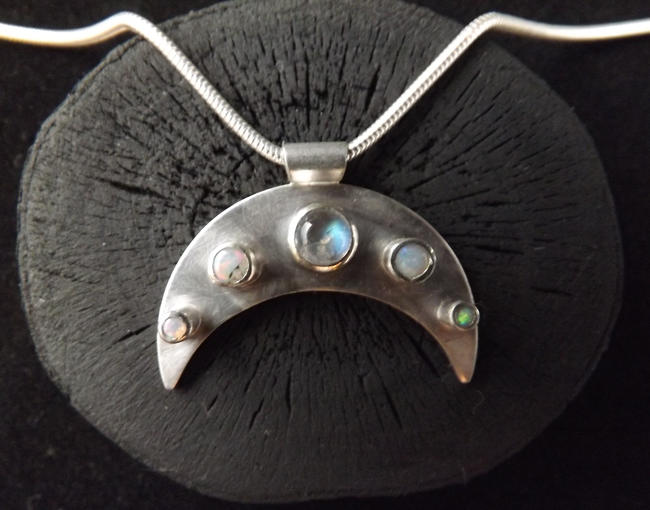 Crescent with stones
