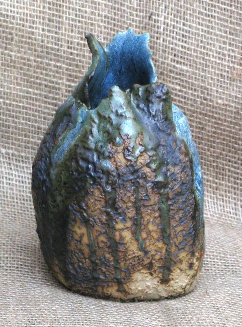 A glazed stoneware vase - front view