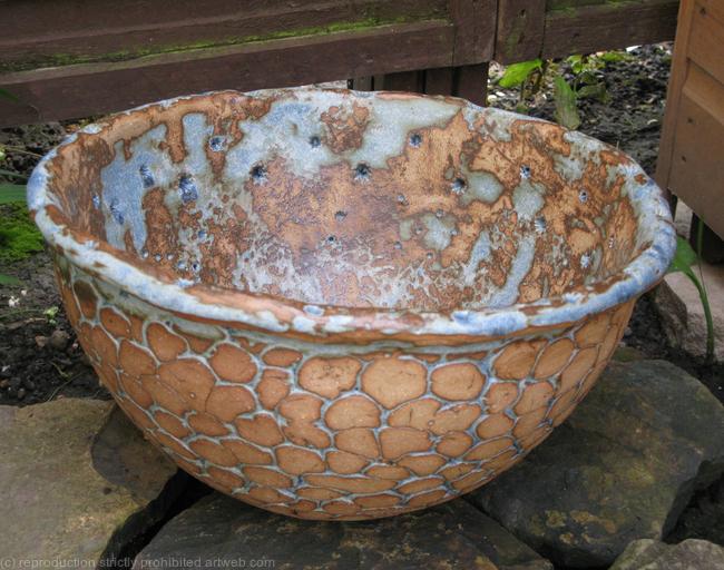 A large stoneware bowl - general view