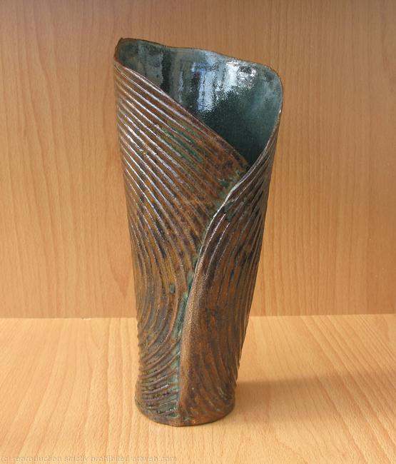 A stoneware tall vase - rear view