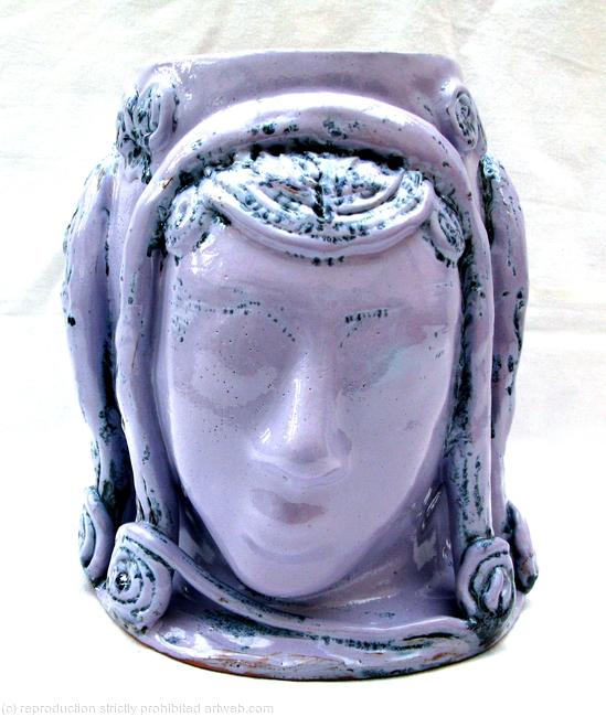 Terracotta bowl with female faces - view 2