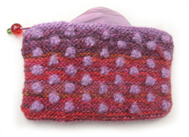 purple-spots-orange-bg-purse