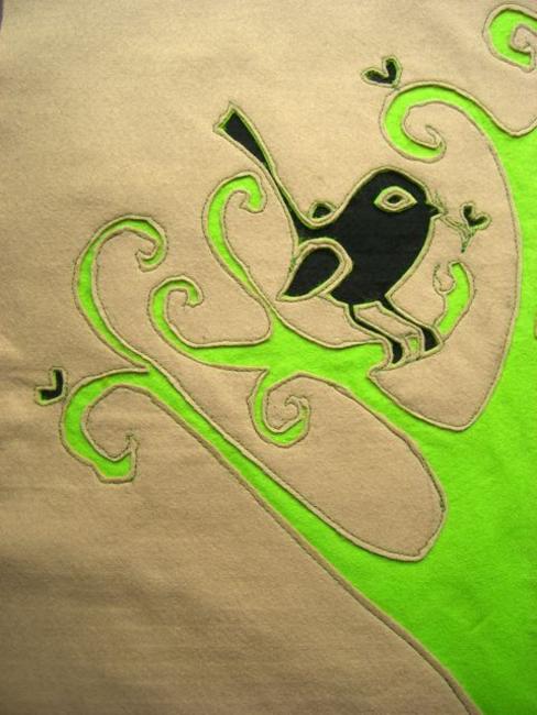 Beige and Green bird cushion detail
