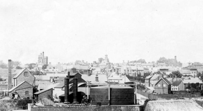 Brackley from the south showing old gas works, c.1900