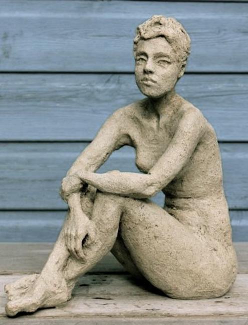 girl hugging her knees