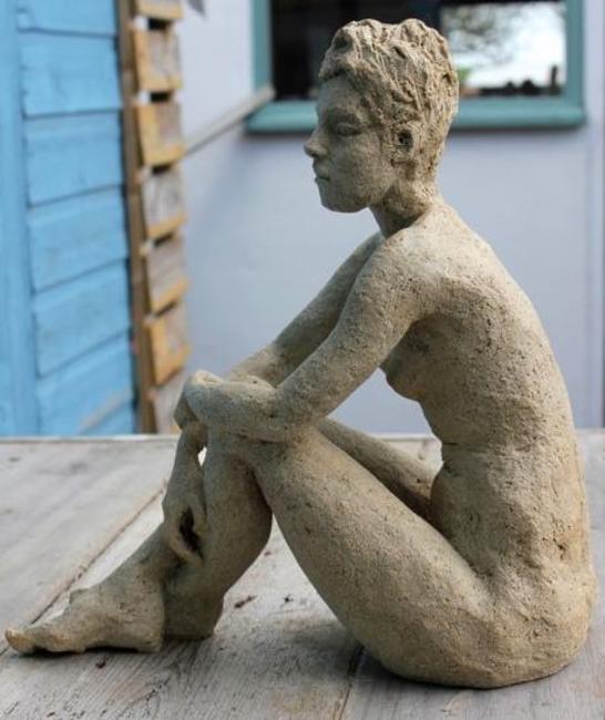 girl hugging her knees