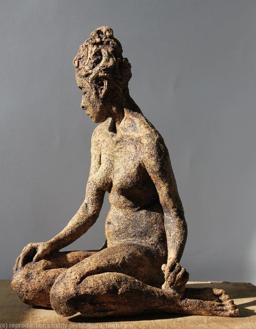 seated woman looking down