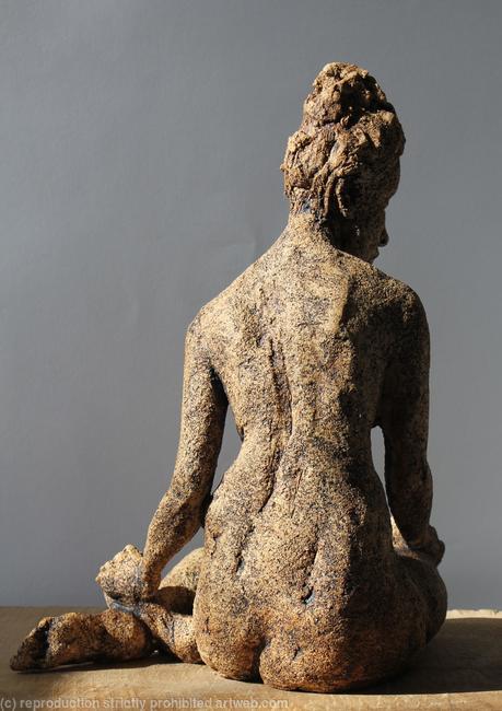 seated woman looking down