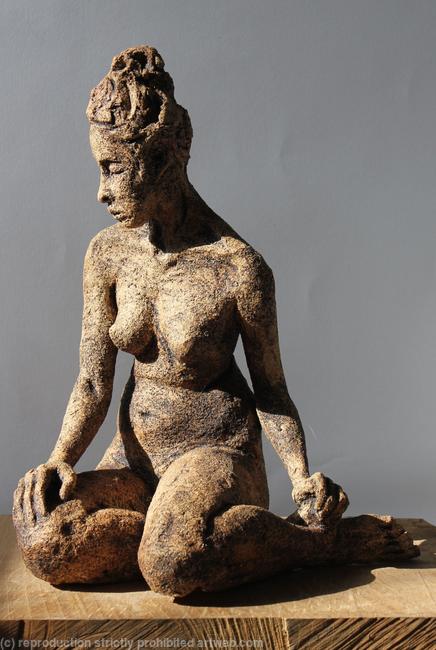seated woman looking down