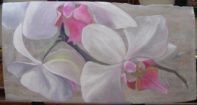 Orchids on wooden panel